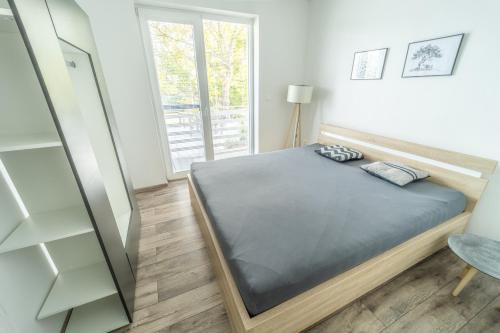 Кровать или кровати в номере Ubytovanie AGATE