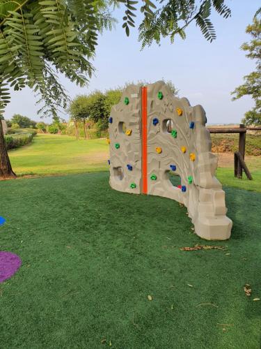 Zona de juegos infantil en Boutique Apartments Caesarea