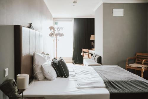 Postel nebo postele na pokoji v ubytování Boutique Hotel Classico Bremen