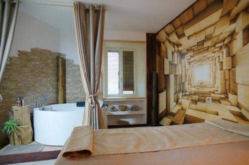 Ένα ή περισσότερα κρεβάτια σε δωμάτιο στο appartment & rooms SecondoPiano