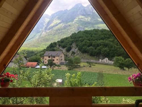 a view of a mountain from a window at Guest House Kollata in Vusanje