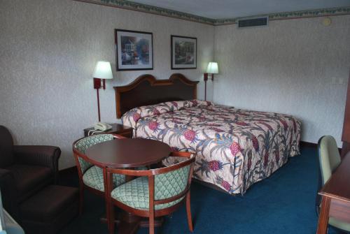Ένα ή περισσότερα κρεβάτια σε δωμάτιο στο Best Motel Lakeland