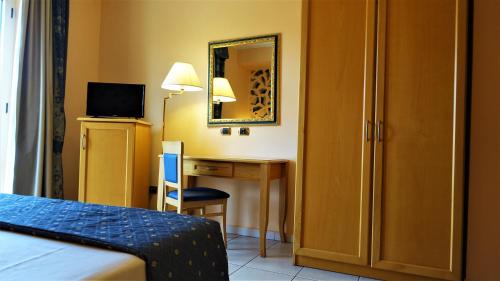 Säng eller sängar i ett rum på Hotel Bristol