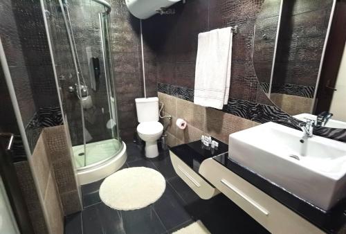 Koupelna v ubytování Hotel Acktion