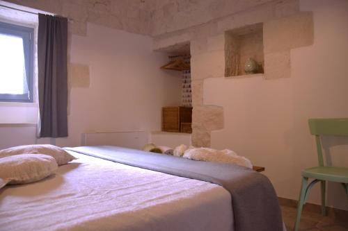 Een bed of bedden in een kamer bij A volte in collina