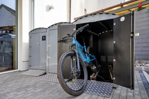 a bike parked inside of a building at Suites MITTE - Aparthotel in Eisenach