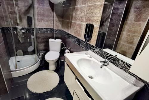 Koupelna v ubytování Hotel Acktion