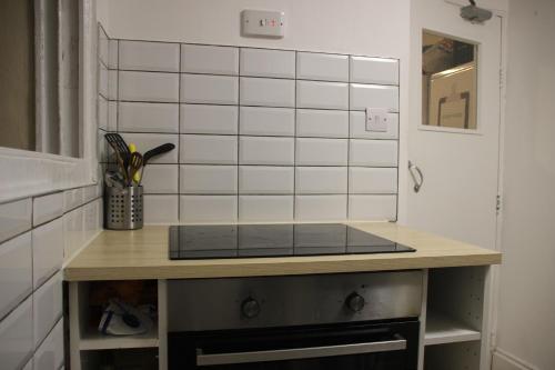 Kuhinja oz. manjša kuhinja v nastanitvi Onefam Notting Hill