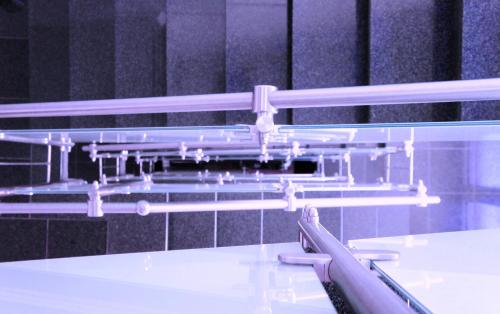 a pair of lights on top of a white table at Business Wieland Hotel in Düsseldorf