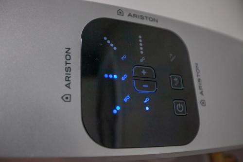a close up of a remote control on an object at Apartman Exclusive Trebinje Centar in Trebinje