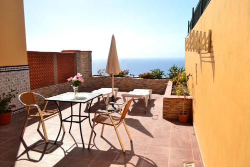 Balcone o terrazza di Apartamentos Casa Junonia