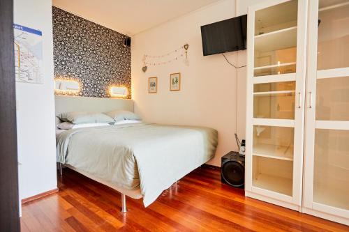 Postel nebo postele na pokoji v ubytování Treehouse Inn
