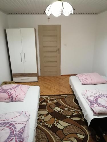 En eller flere senger på et rom på VillaMaria