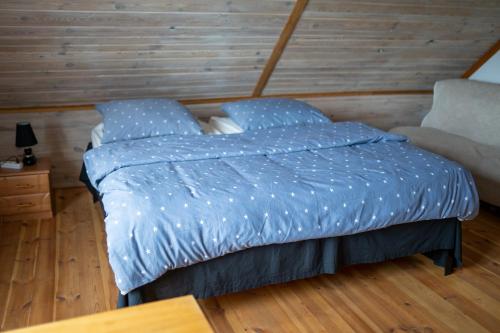 Кровать или кровати в номере bizon