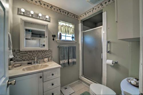 A bathroom at Long Island Village Escape with Deck and Pool Access!