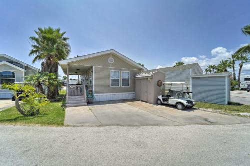 a house with a car parked in front of it at Deck and Pool Access Long Island Village Escape! in Port Isabel