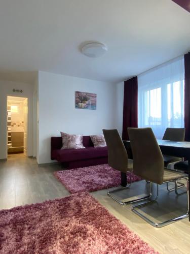 Ένα ή περισσότερα κρεβάτια σε δωμάτιο στο 12 RESIDENCE APARTMENT
