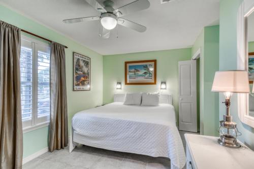 Säng eller sängar i ett rum på Grand Caribbean West