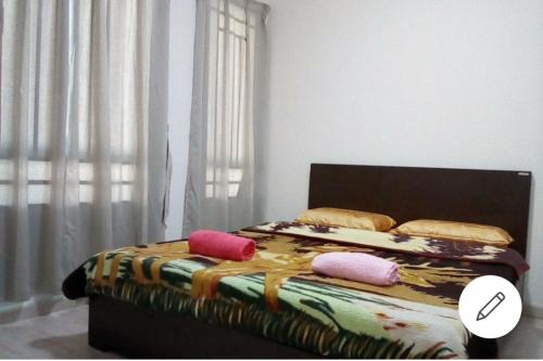 Postel nebo postele na pokoji v ubytování Cozy Apartment