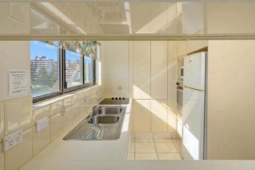 Η κουζίνα ή μικρή κουζίνα στο Bayview Apartments Rainbow Bay