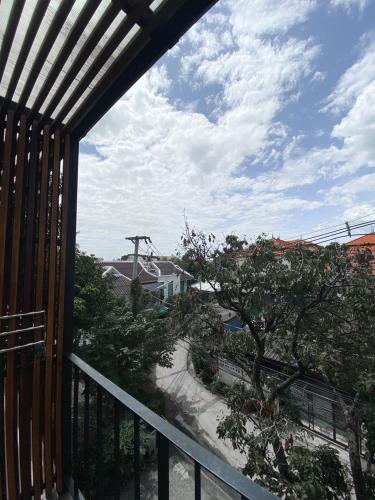 a view from the balcony of a house at Lamphu House Chiang Mai in Chiang Mai