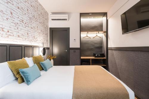 Letto o letti in una camera di BYPILLOW San Mamés