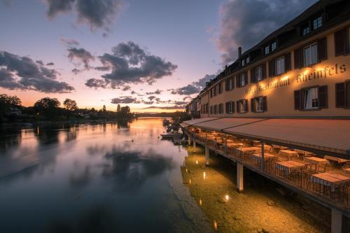 a large body of water with boats docked at Hotel Rheinfels in Stein am Rhein