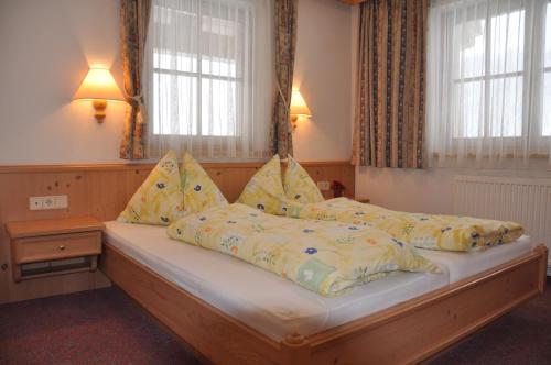 Ένα ή περισσότερα κρεβάτια σε δωμάτιο στο Landhaus Marten
