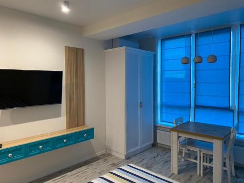 TV a/nebo společenská místnost v ubytování Magic Days Apartments