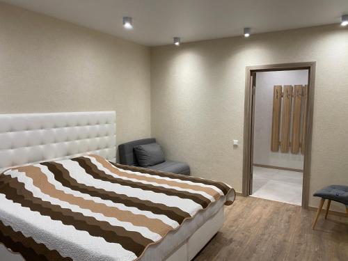 Postel nebo postele na pokoji v ubytování Magic Days Apartments