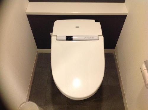a bathroom with a white toilet in a room at Hakata Tokyu REI Hotel in Fukuoka
