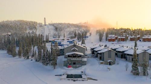an aerial view of a ski resort in the snow at Hotel Rukatonttu in Ruka
