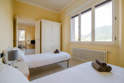 Postel nebo postele na pokoji v ubytování Villa Vittoria - The House Of Travelers