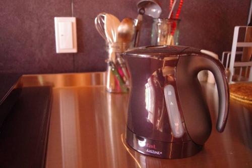 a blender sitting on top of a table at Miyajima Breeze in Hatsukaichi