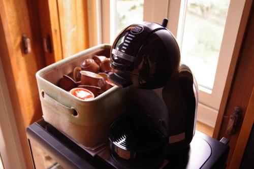 a mixer sitting on top of a table with food at Miyajima Breeze in Hatsukaichi