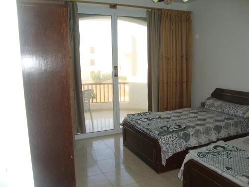 Luxury Villa Panorama Beach tesisinde bir odada yatak veya yataklar