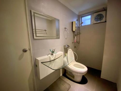 Ένα μπάνιο στο Maison Seaview Suites Port Dickson