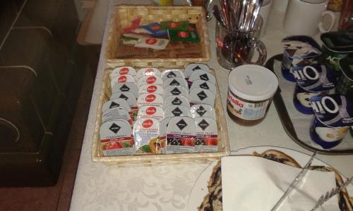 a table topped with two boxes of japanese sushi at Tiffán's Pincészet és Panzió in Villány