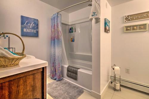 a bathroom with a shower and a sink at Waterfront House with Glacial Views - Near Downtown! in Juneau