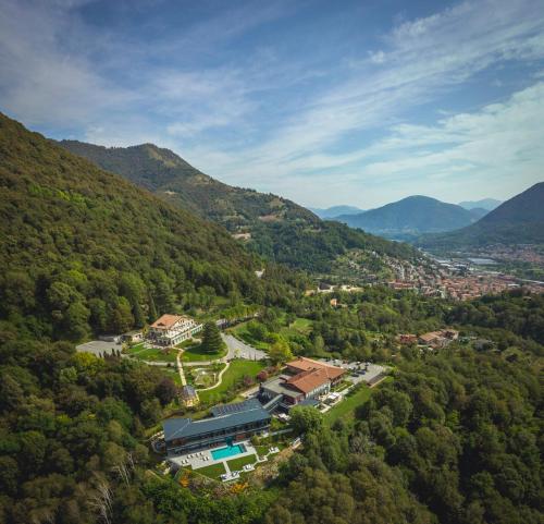 an aerial view of a town in the mountains at Phi Hotel Piajo in Nembro