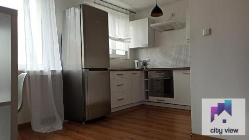 Kuchyňa alebo kuchynka v ubytovaní CITY VIEW Zamenhofa