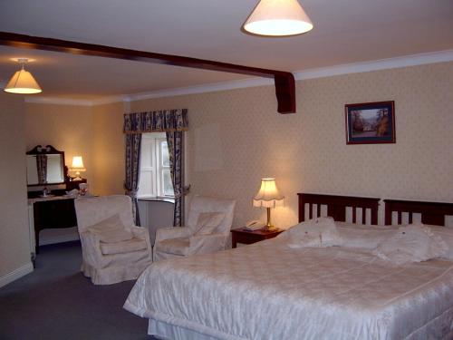 Postel nebo postele na pokoji v ubytování Richmond Country House & Restaurant