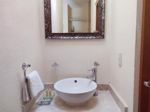 Kylpyhuone majoituspaikassa Villa Perfecta Zona Diamante