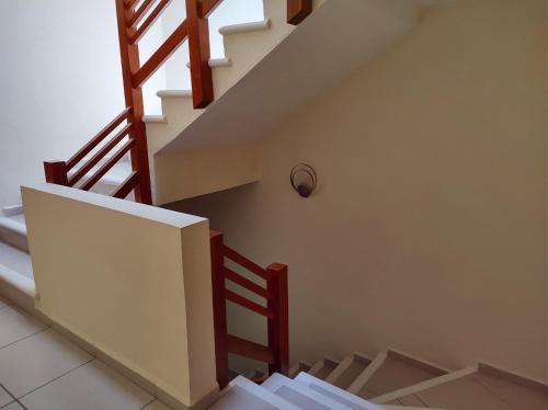 a staircase in a house with a stair case at Villa Perfecta Zona Diamante in Acapulco