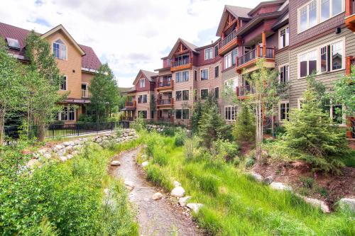 a path in the middle of a row of buildings at Water House on Main Street in Breckenridge