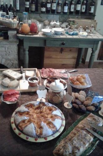 a table full of food on a table at Agriturismo Brusalino in Mango