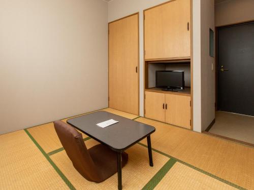 Kuchyň nebo kuchyňský kout v ubytování Tabist Business Ryokan Duck Ishinomaki Hebita