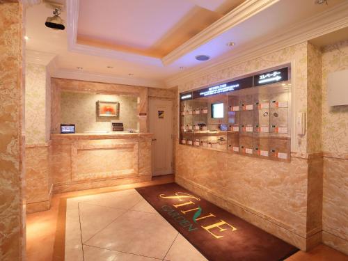 a room with a pharmacyacistacistacistacist at Hotel Fine Garden Senboku in Sakai