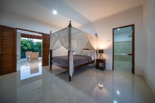 Llit o llits en una habitació de Villa Devina - Seminyak