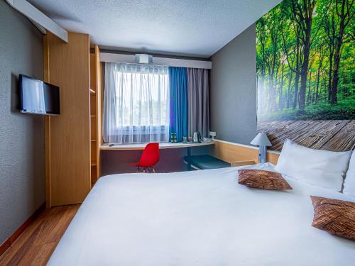 Łóżko lub łóżka w pokoju w obiekcie Ibis Katowice - Zabrze